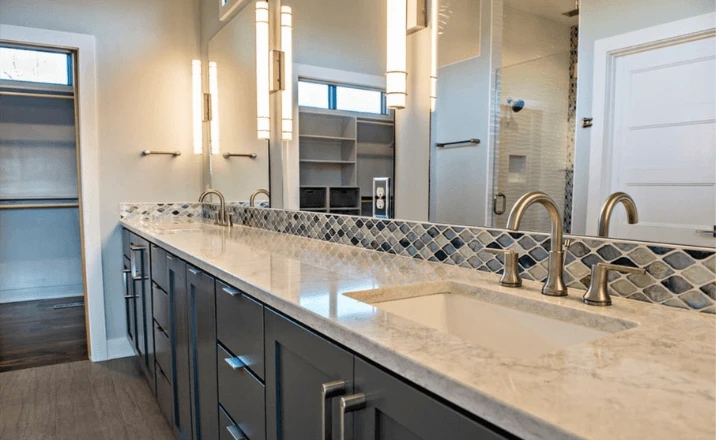 blue backsplash tile in a bathroom